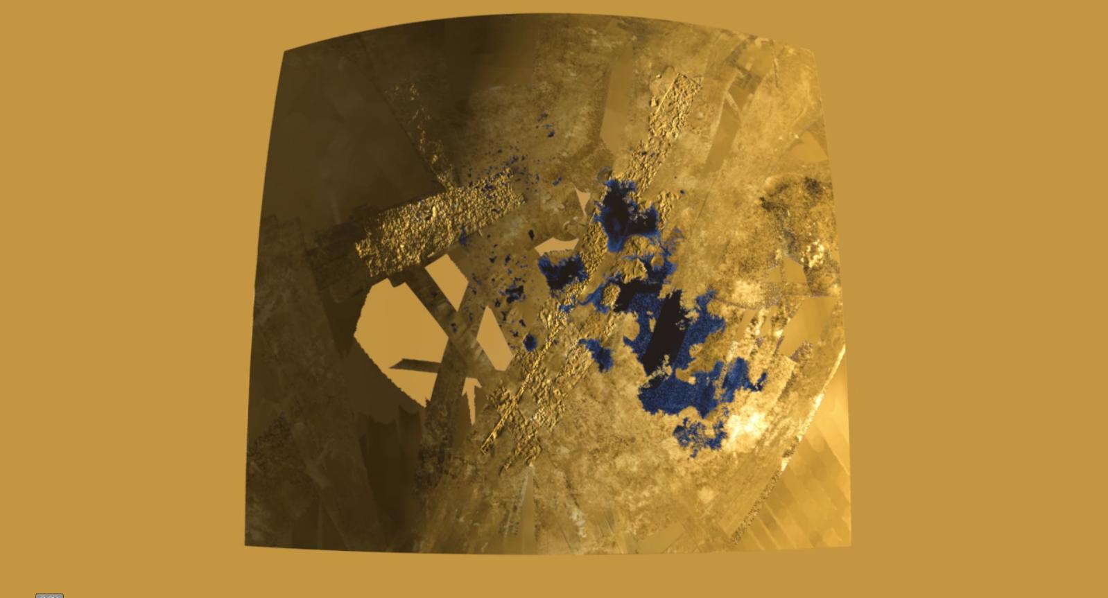 This frame from a colorized flyover movie from NASA Cassini mission shows the two largest seas on Saturn moon Titan and nearby lakes. The liquid in Titan lakes and seas is mostly methane and ethane.