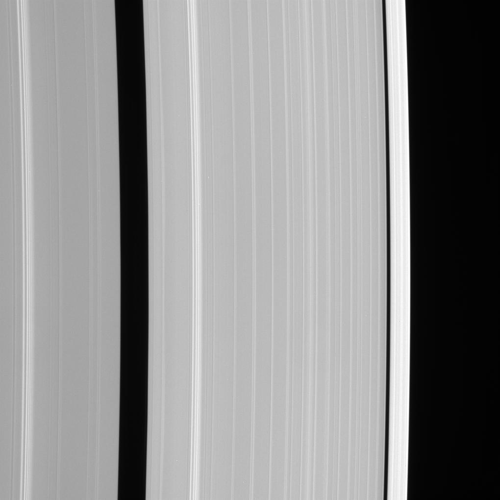 This Cassini spacecraft view shows details of Saturn outer A ring, including the Encke and Keeler gaps. The A ring brightens substantially outside the Keeler Gap