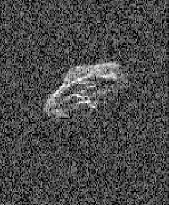 Scientists using two giant, Earth-based radio telescopes bounced radar signals off passing asteroid 2011 UW158 to create images for an animation showing the rocky body fast rotation. This is a frame from the animation.