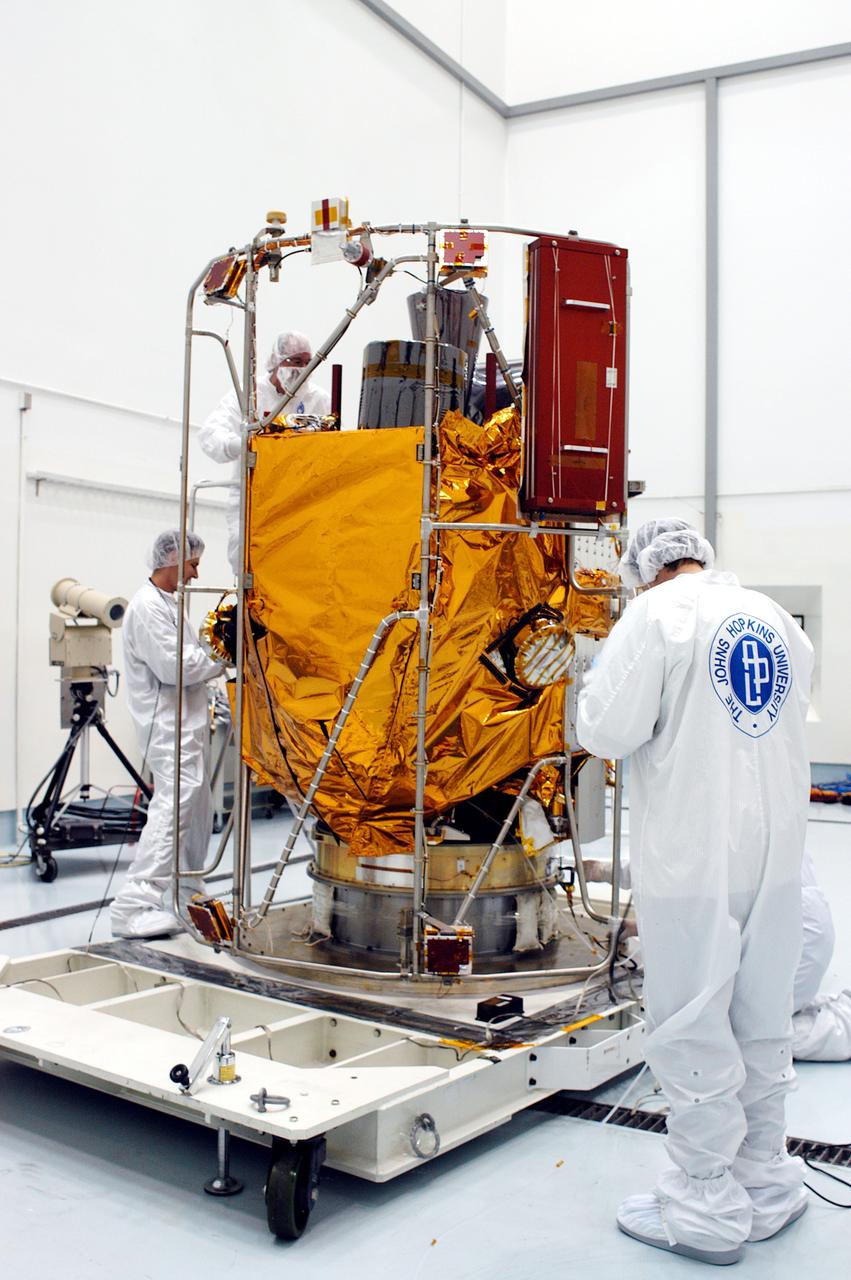 KENNEDY SPACE CENTER, FLA. - In the high bay clean room at the Astrotech Space Operations processing facilities near KSC, NASA’s MESSENGER spacecraft is revealed. Employees of the Johns Hopkins University Applied Physics Laboratory, builders of the spacecraft, will perform an initial state-of-health check. Then processing for launch can begin, including checkout of the power systems, communications systems and control systems. The thermal blankets will also be attached for flight. MESSENGER - sh