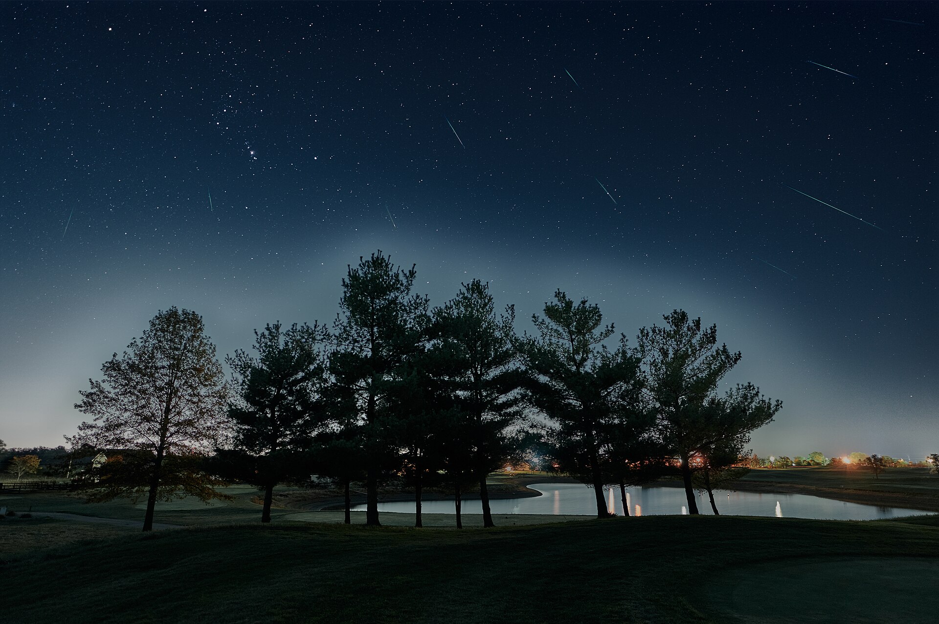 This is a composite of 19 selected frames from an overnight timelapse that captured the Orionid meteor shower. Meteors: 10 frames at 15 second shutter, ISO 800, f/2.2 Sky: 8 frames at 15 second shutter, ISO 800, f/2.2, stacked Foreground: 1 frame at 30 second shutter, ISO 1600, f/1.8 Post Processing: Capture One for RAW development and editing, ON1 Photo RAW for composition, Starry Landscape Stacker for stacking