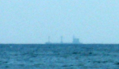 Ship at horizon: due to earth curvature lower part is invisible.