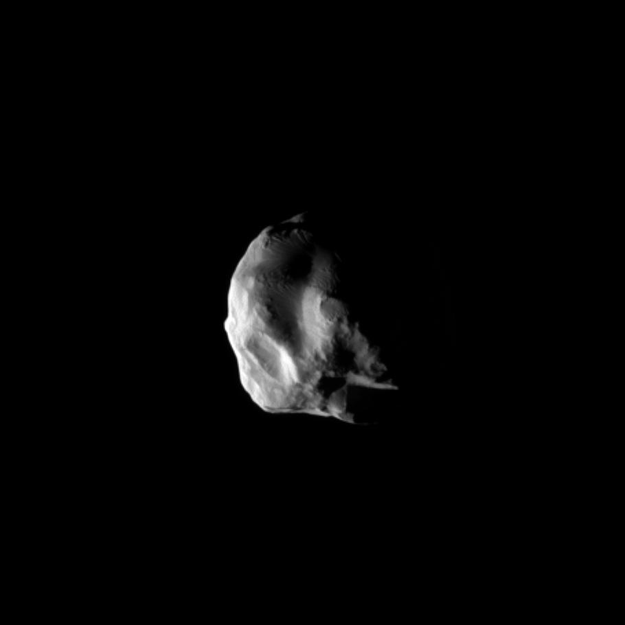 NASA Cassini spacecraft snapped this image during the spacecraft closest flyby of Saturn moon Helene, on March 3, 2010. Helene is a Trojan moon of Dione, named for the Trojan asteroids that orbit ahead of and behind Jupiter.