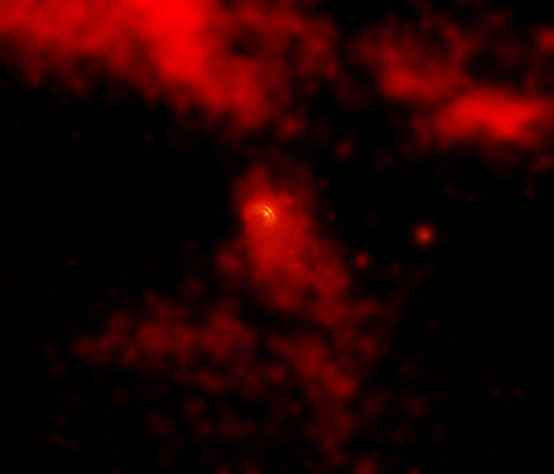 Imagem de raios X em campo amplo do pulsar Vela e de sua nebulosa, cercados por filamentos de gás superaquecido do remanescente de supernova.