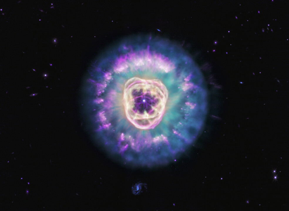The James Webb Space Telescope observed planetary nebula NGC 2392 in mid-infrared light, revealing the presence of dust and its varying structures within this tumultuous environment. Nicknamed the Lion Nebula due to its appearance, this col